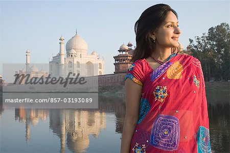 Woman with a mausoleum in the background, Taj Mahal, Agra, Uttar Pradesh, India