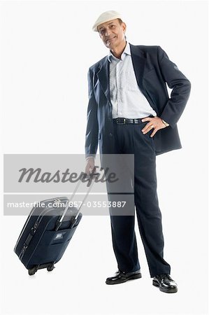 man carrying luggage