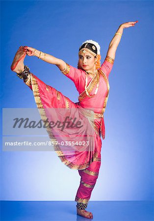 Dancer in an Indian Classical Dance Pose Wearing Traditional Costume  Consisting of a Sari Choli and a Ghungroo Anklet · Free Stock Photo