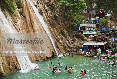 Tourists having fun in Kempty Falls, Mussoorie, Uttarakhand, India