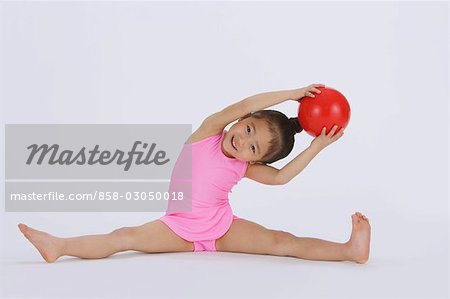Girl performing rhythmic gymnastic