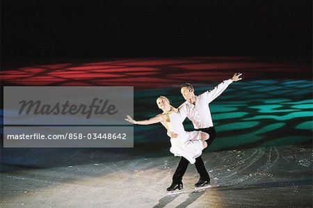 Figure Skaters with Arms Outstretched