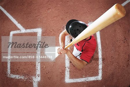 Batter Swinging Baseball Bat