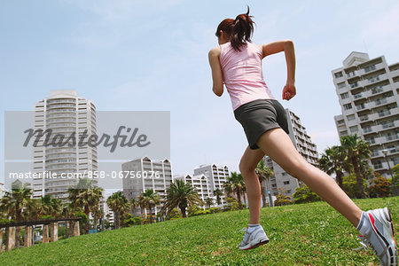 Woman Jogging In A Park