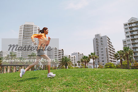 Woman Jogging In A Park