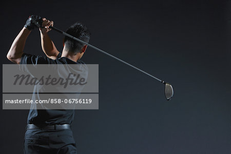 Golfer Swinging,  Studio Shot