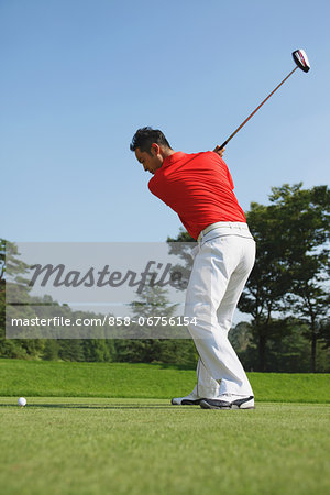 Golfer Concentrating On Shot