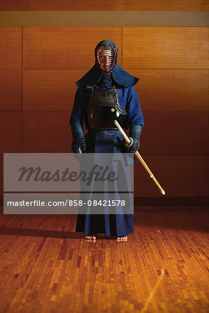 Japanese kendo athlete preparing for the fight
