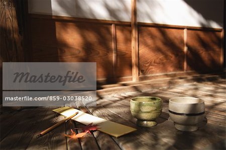 Writing board and pencil with maple leaves and bowls