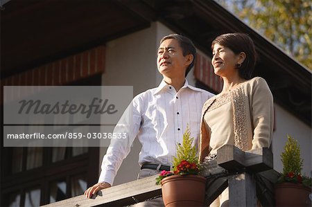 Front view of a middle-aged couple standing together