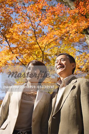 Front view of a middle-aged couple smiling