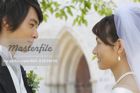 Bride and Groom Looking at Each Other