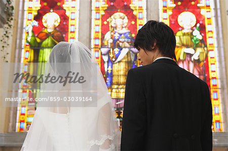 Bride Standing with Groom in Church