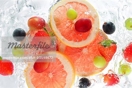 Fruits Splashing In To Water