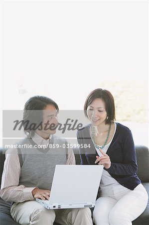 Couple Looking At PC