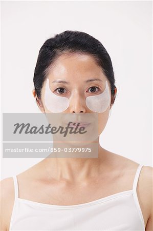 Woman With A Smear Of Beauty Cream On Face