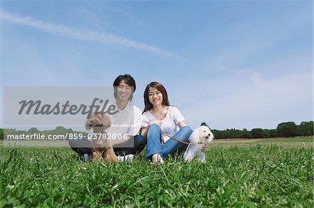 Couple in Park with their Pets