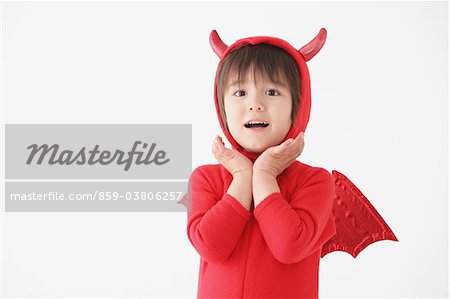 Boy in Red Devil Costume