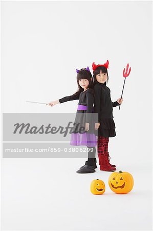 Two Girl Dressed In Halloween Costume