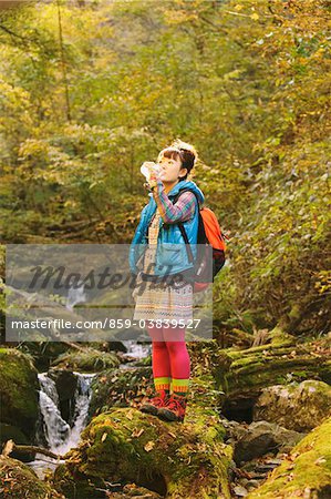 Female Hiker Drinking Water Whilst Hiking