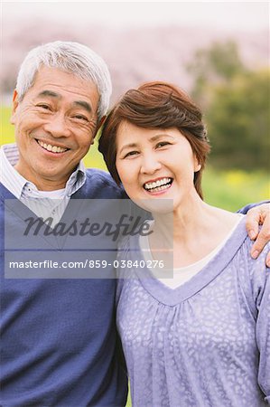 Portrait Of Affectionate Middle-Aged Japanese Couple