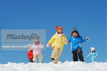 Children Running In The Snow