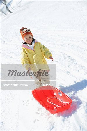 Girl Pulling Sled