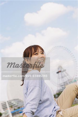 Japanese Women Sitting And Smiling