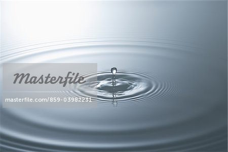 Droplet Splashing On Water Surface