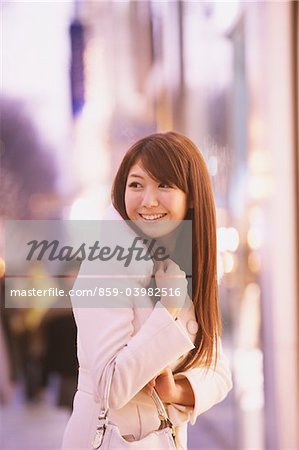 Japanese Women Smiling And Looking Away