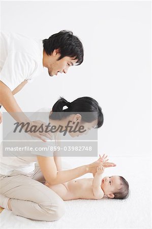 Parents Enjoying With Baby