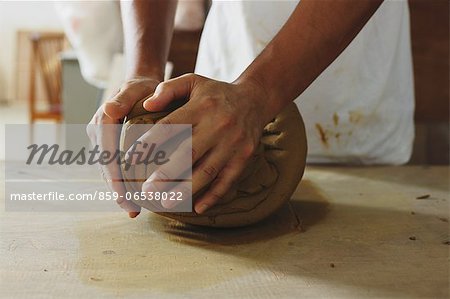 Craftsman working clay