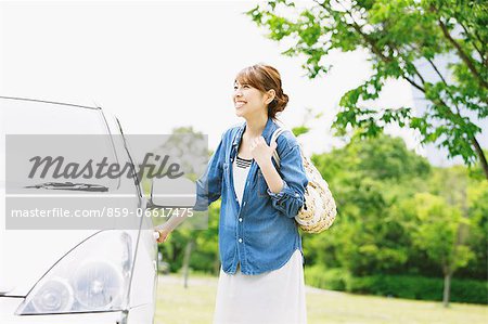 Woman Smiling With Car