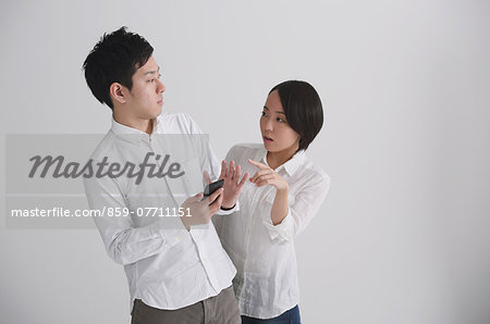 Young Japanese couple having an argument Young Japanese couple having an argument