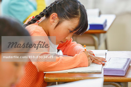 Japanese elementary school kid in the classroom