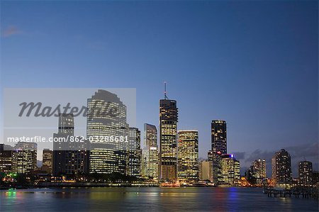 The lights of Brisbane's business district are reflected in the waters of the Brisbane River.