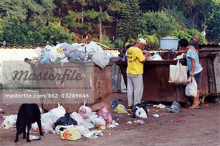 Homeless scavenge in the bins in a Favela in Sao Paulo