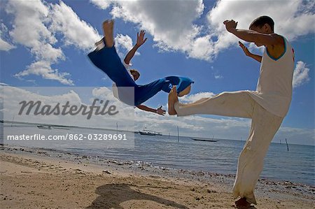 Capoeira,the Brazilian fight-dancing martial art,demonstrated on a Tinhare archipelago beach in the Bahia region of the north east of Brazil
