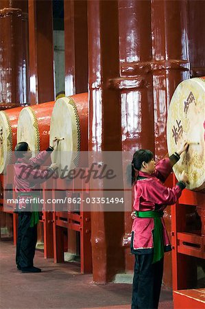 China,Beijing. Drummers inside The Drum Tower,a later Ming dynasty version originally built in 1273 marking the centre of the old Mongol capital,Asia.