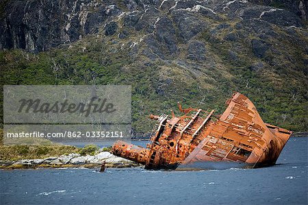 Chile,Patagonia,Beagle Channel,Chilean Fjords. Ship wreck of an unfortunate passenger vessel beached on the shore in the Chilean Fjords.