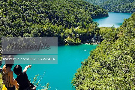 Girls looking at the Turquoise Lakes and Waterfall