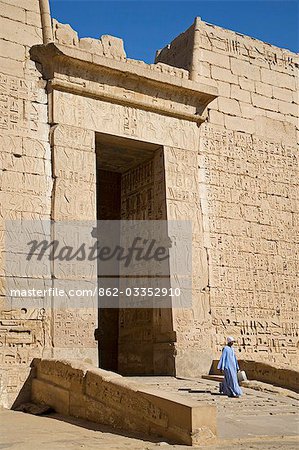 A colossal doorway through the second pylon of Ramses III's mortuary temple at Medinet Habu,Luxor,Egypt