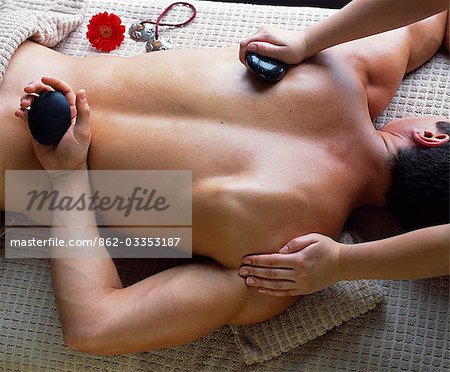 A male guest receives a hot stones massage at Slieve Donard Resort and Spa,Newcastle,County Down