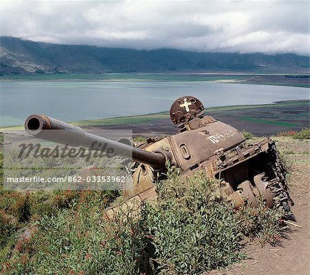 The defeated forces of the former Ethiopian dictator,Mengistu Haile Mariam,left behind this wrecked Russian-made tank near Lake Ashange in northern Ethiopia.Africa's regional and ethnic wars divert scarce resources away from urgent development projects that could uplift the living standards of the people..