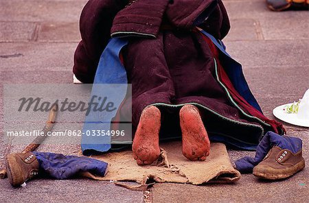 Jokhang Temple,Barkhor Square - Situated in the heart of Lhasa's Old Quarter and first built in the 7th century,the Jokhang is Tibet's most sacred shrine. Pilgrims still prostrate themselves daily before the main entrance whose flagstones have over the centuries,been worn smooth.