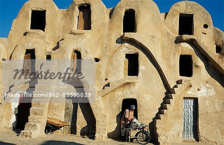 Tunisia,Medenine. Once amongst the most important if the south's Berber market towns,Medenine's ksar,or fortified granary,was one of the largest and honey-combed with 8000-ghorfas,or storage cells,for grain and valuables. Only a few are still used today.