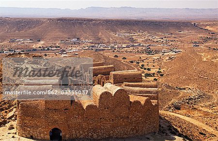Tunisia. A fine example of a ksar,or fortified granary,showing its barrel vaulted roofs,blank walls and central courtyard. Abandoned in 1973,some basic restoration work has ensured the ksar's immediate survival.