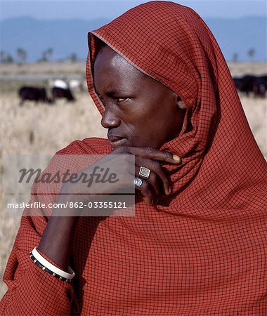 A young Datoga man tends his family's livestock on the plains east of Lake Manyara in Northern Tanzania.The Datoga (known to their Maasai neighbours as the Mang'ati and to the Iraqw as Babaraig) live in northern Tanzania and are primarily pastoralists..