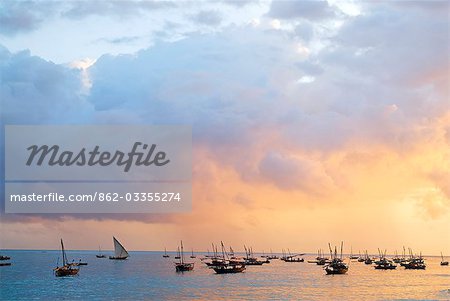 East Africa; Tanzania; Zanzibar. A dhow is a traditional Arab sailing vessel with one or more lateen sails. It is primarily used along the coasts of the Arabian Peninsula,India,and East Africa.