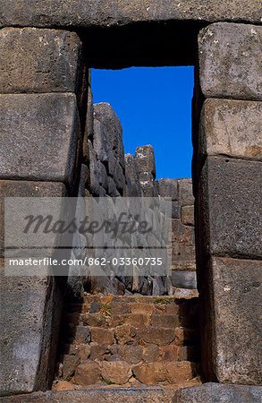 Sacsayhuaman fortress above Cusco is one of the most impressive of all the Inca ruins. The trapezoidal door is classic Inca architecture,built to withstand earthquakes unlike the Spanish arches which frequently tumble down.